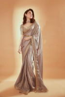 What color and embroidery combinations suit Net Ki Sadi for evening events?